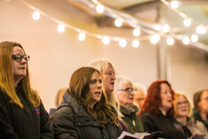 Females singing near lights 