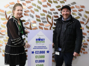 Female and Male with a fundraising arrow