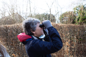 Female with binoculars