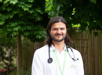 Male smiling at the camera