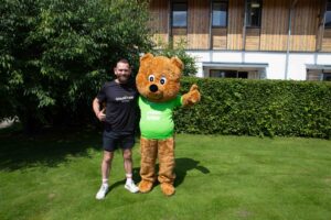Male with life sized Bear