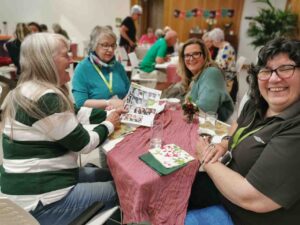 Females sitting at a table 