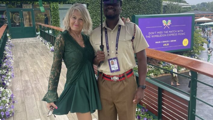 Lady and man under Wimbledon Umbrella