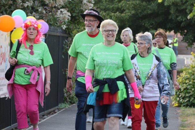 People dressed in green walking