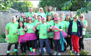 Group of adults wearing green 