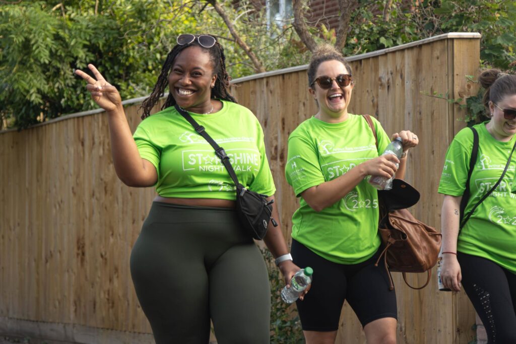 Group of 3 lady walkers wearing bright green star shine tshirts