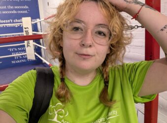 Female in a green T-shirt