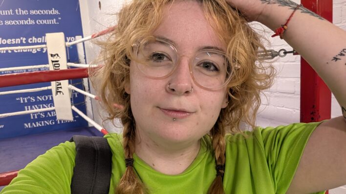 Female in a green T-shirt
