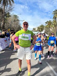 Male in green running gear