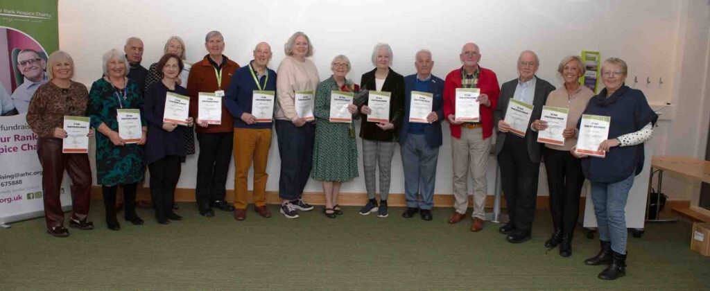 Group of males and females with certificates 