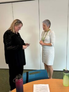 2 females with an award