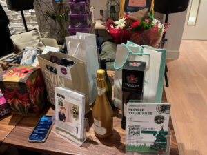 Table with gift bags and leaflets