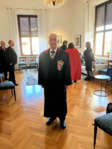 Male in long black cape