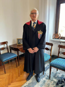 Male wearing long black cape