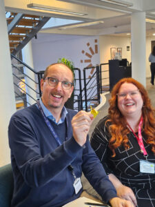 Male and female with origami