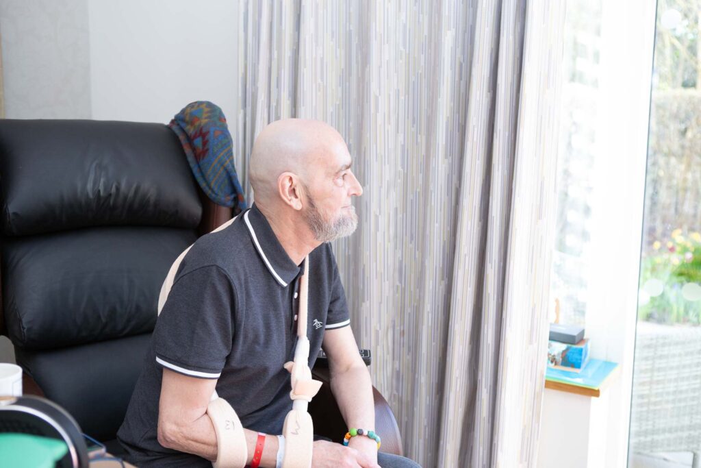 Male looking out of the window