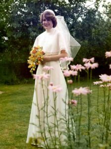 Female in Wedding dress in the garden