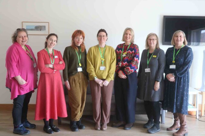 seven females standing in line