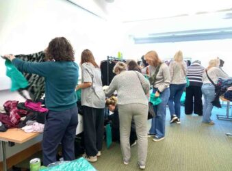 Females looking at clothes