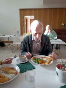 Male eating in a Bistro