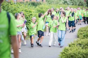 Children wearing green walking