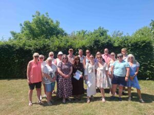 Group of men and women outside