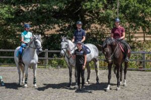 Females and 3 horses