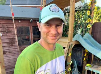 Male wearing a green T-shirt