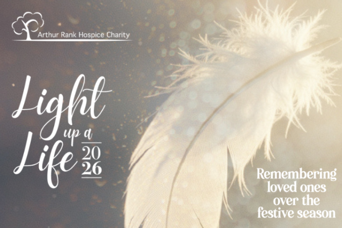 Light up a Life 2026 text. White feather on dark sparkly background. Remembering loved ones over the festive season.