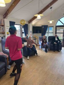 Adults in a chair