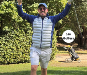 Male with a golf trolley cherring